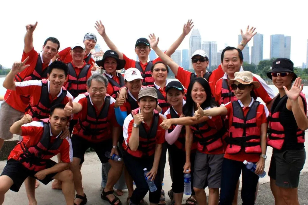 A happy corporate team celebrating after successful team building activities